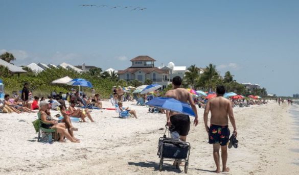Las playas llenas y el COVID-19 en aumento en la reapertura de Florida